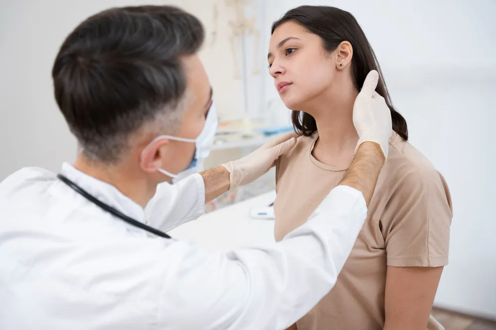 Doctor assessing patient’s neck injury for whiplash diagnosis.